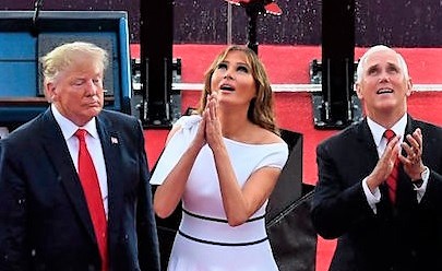 Rain Proves No Match For The First Lady Who Shined On 4th Of July Wearing Classy Off-The-Shoulder Dress