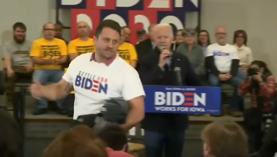 “You Are The Hillary Of 2020” – Man Wearing “Settle For Biden” Shirt Trolls Sleepy Joe At Campaign