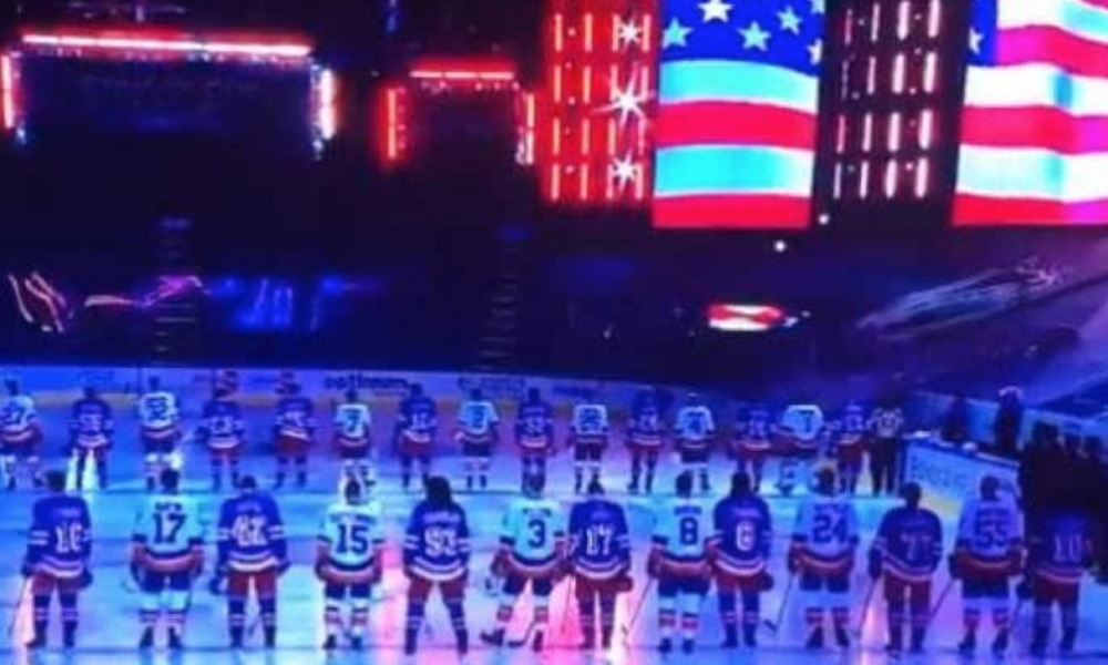 WATCH: NHL’s Rangers And Islanders Stand Side By Side During National Anthem